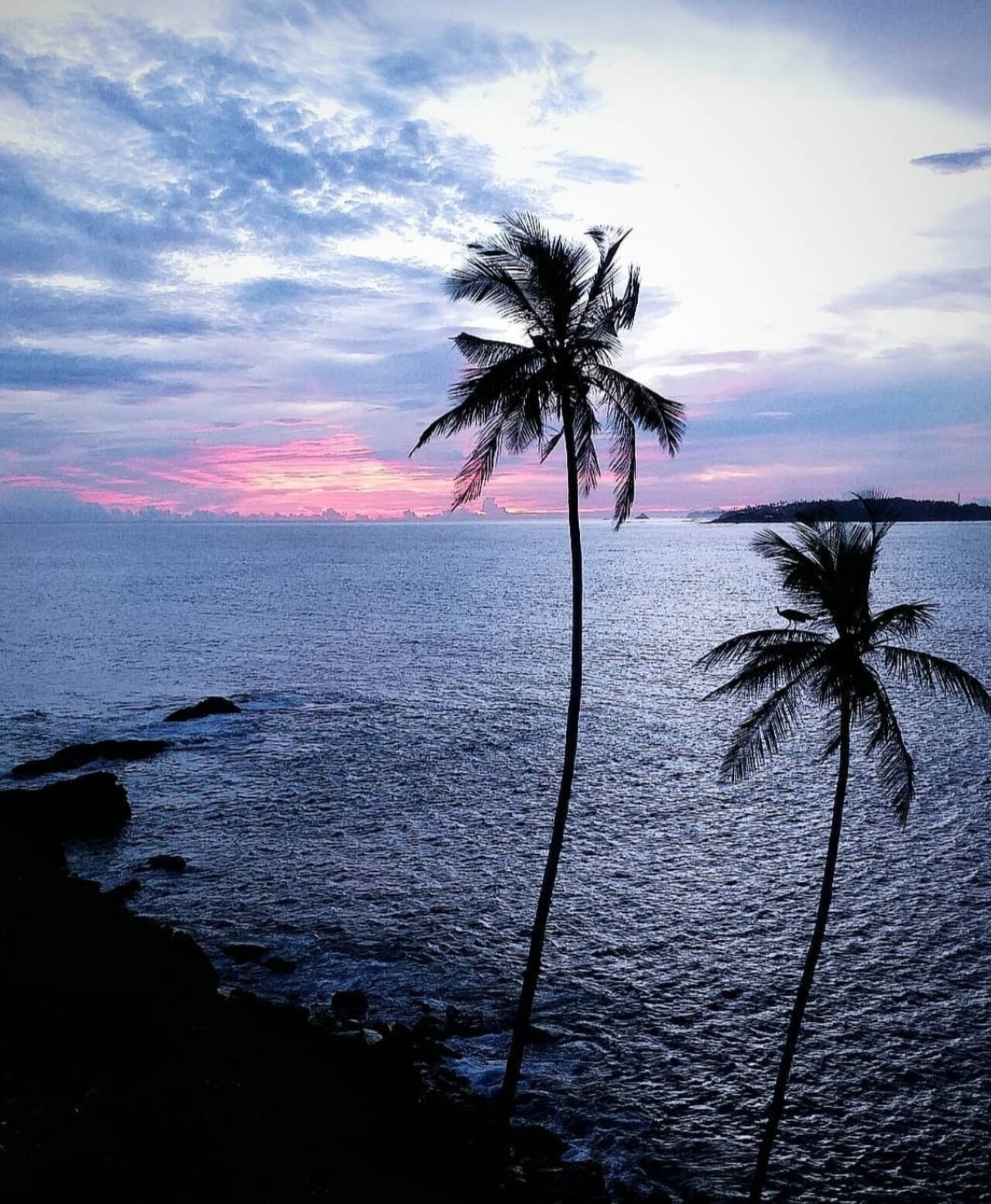 Sunset over the ocean at Mirissa